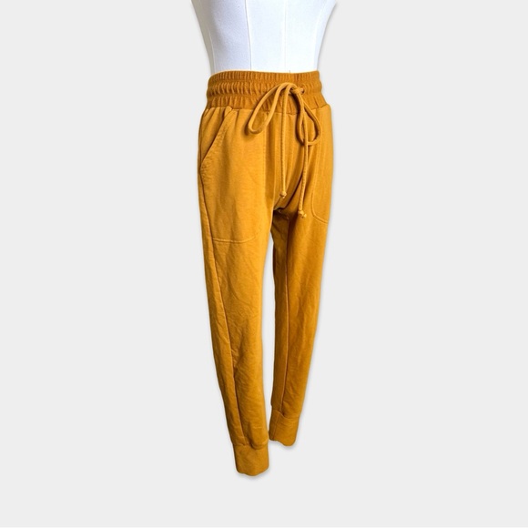 47. FREE PEOPLE MOVEMENT Joggers Size XS Orange Yellow Color - Picture 2 of 4